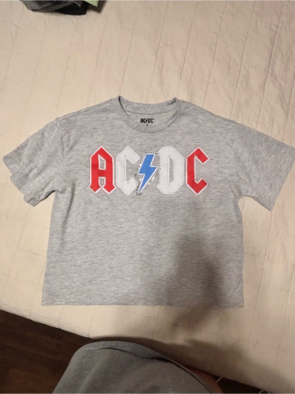 AC/DC Women’s Grey Logo Tee with Red & Blue Accents